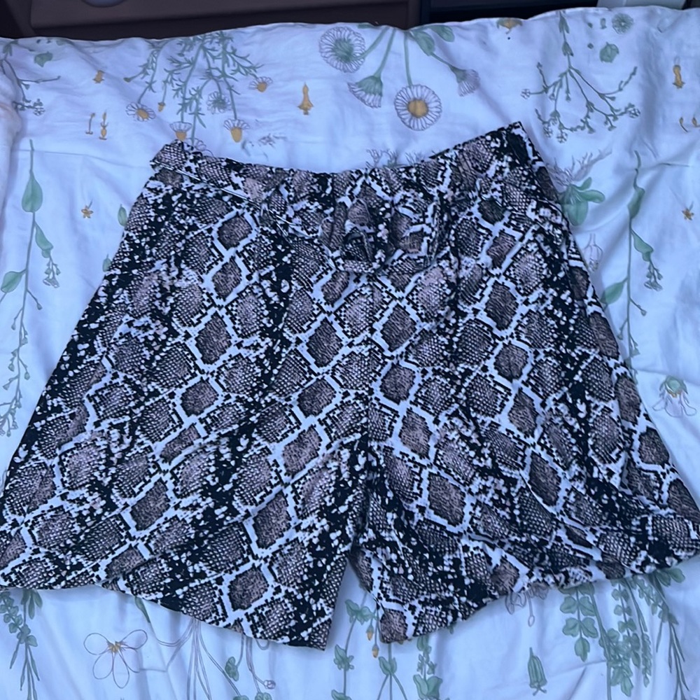 Snakeskin stretchy, belted pants